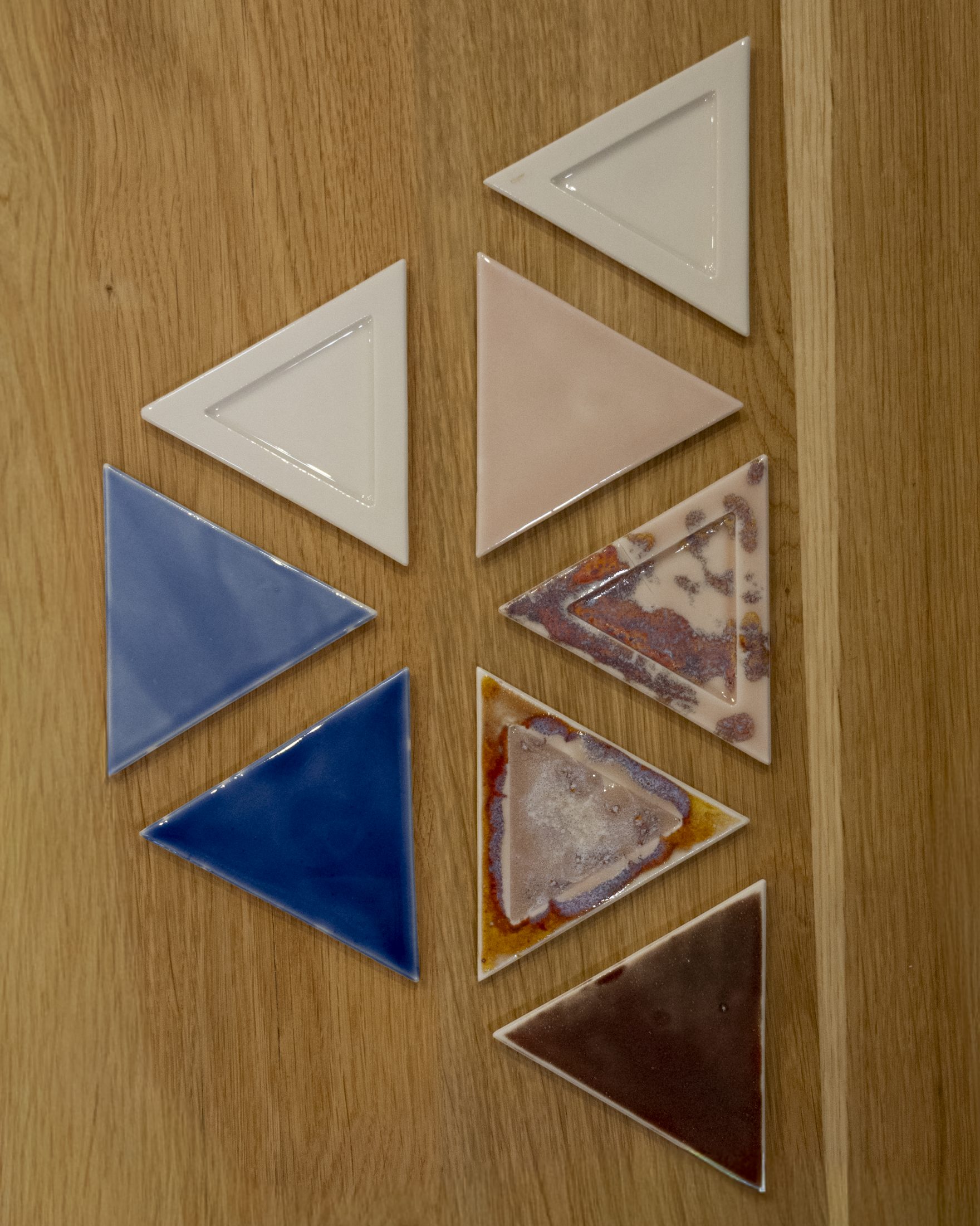 Lumvia triangular inlay samples set in oak